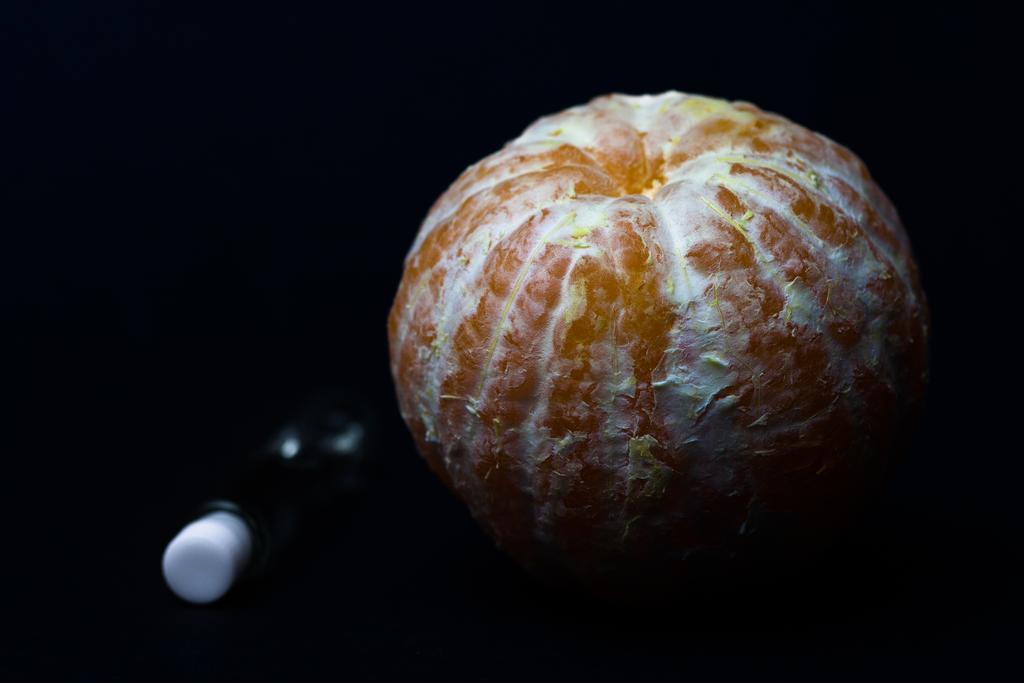 Artistic photograph An orange and perfume. by Sergey Vasilev on PhotoCodex